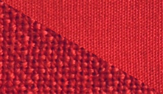 Fabric swatch dyed in ruby red, demonstrating the vibrant color achieved with our dye on different fabrics